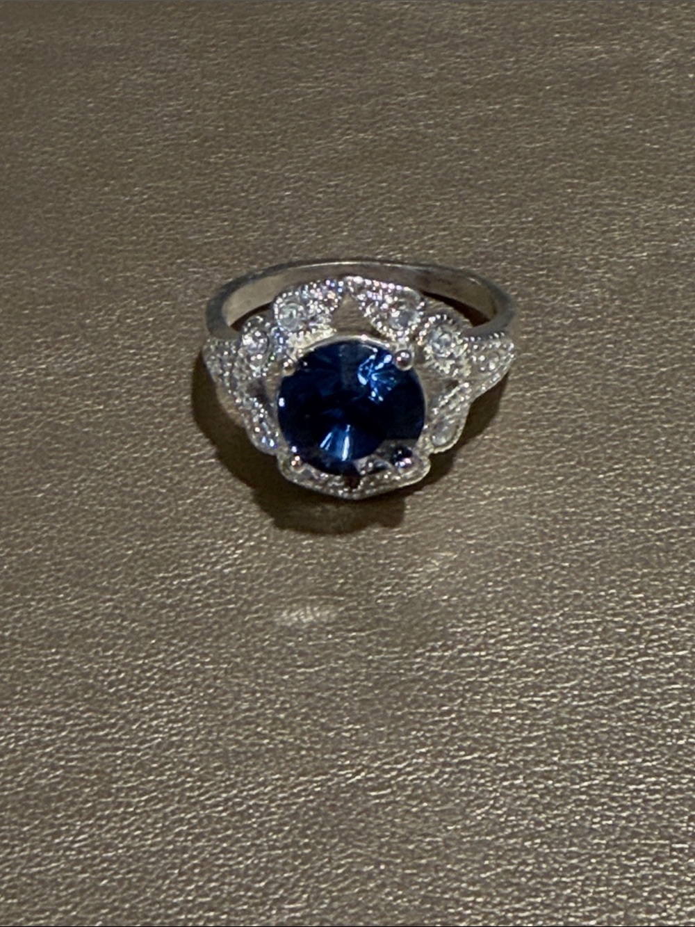 Avon Silver-Tone Ring with Deep Blue Center and Sparkling Halo